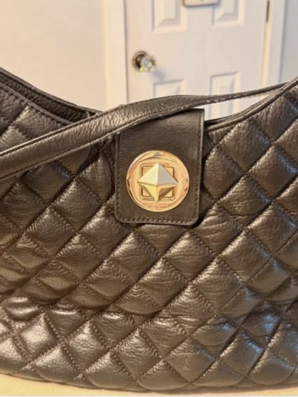 Kate spade Quilted Black Leather Shoulder Bag with Gold Medallion
